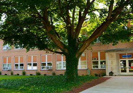 Exterior of a two story brick school