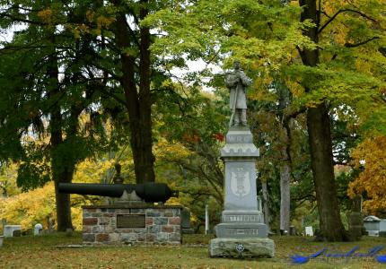 Cemetery monuments and cannon