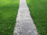Image of an example problem sidewalk that shows an uneven surface