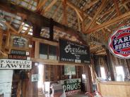 Collection of vintage community signs in old interior of the Historic Pears mill 