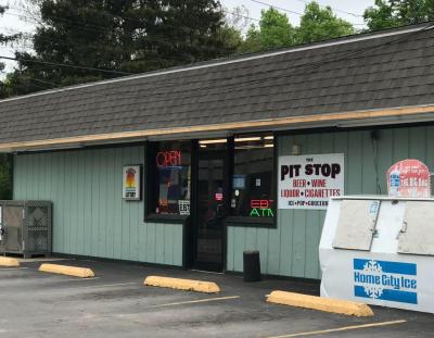 Exterior of a blue convenience store