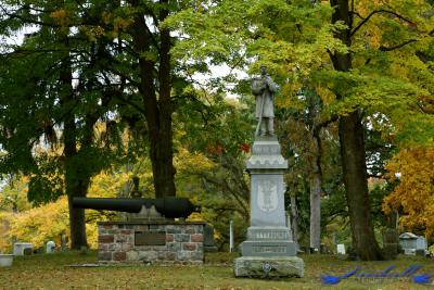 Cemetery monuments and cannon