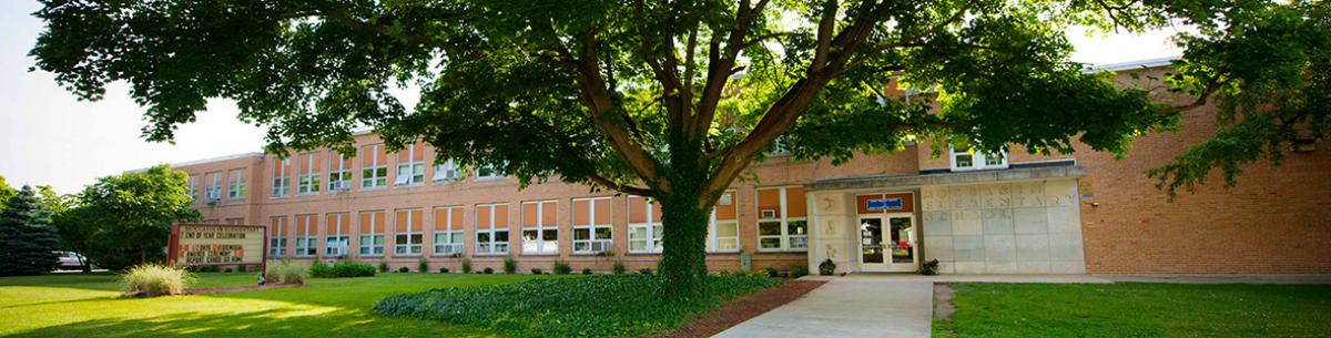 Exterior of a two story brick school